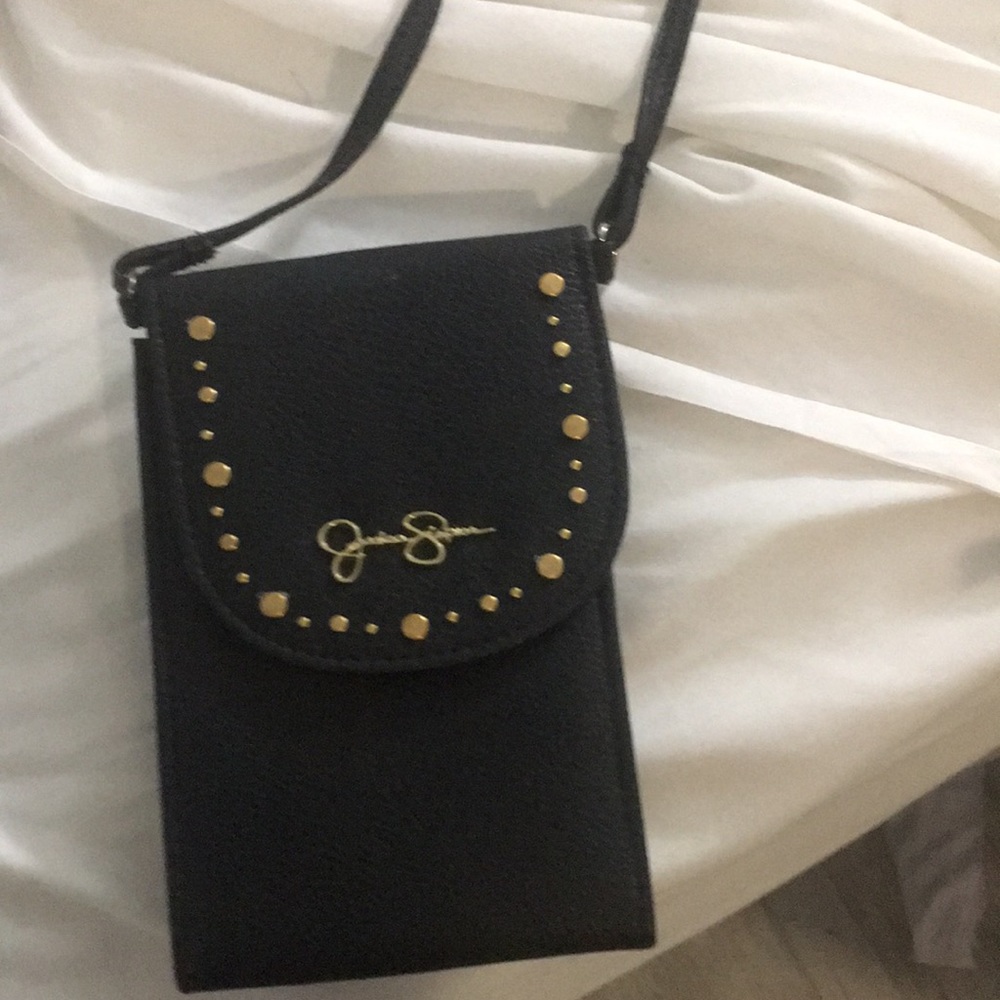 Jessica Simpson over the shoulder purse